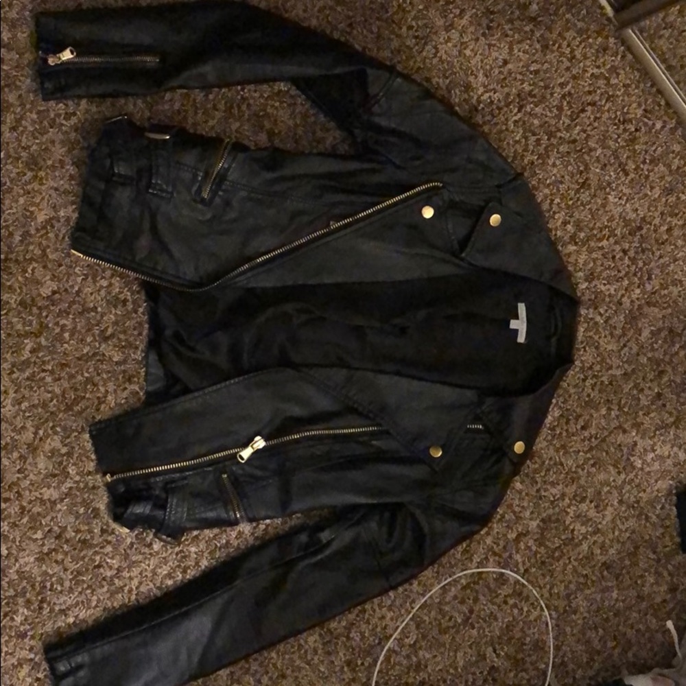 Black leather jacket with gold details